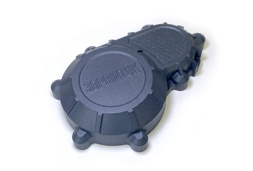 SLS 3d printed part showing the premium dyed black and shot peened finish